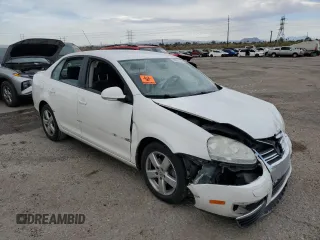 2009 Volkswagen Jetta S with VIN 3VWJM71K69M035974, listed as a Copart auction lot 56979765 with Not provided miles and Salvage title. Bid and sale history available at DreamBid. Image 4.
