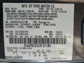2020 Ford Fusion SEL z VIN 3FA6P0CD3LR131180, wystawiony jako Copart lot #63843355 z przebiegiem 146 705 mil mil oraz Czysty tytuł • Clean title. Historia ofert i sprzedaży dostępna na DreamBid. Obrazek 12.