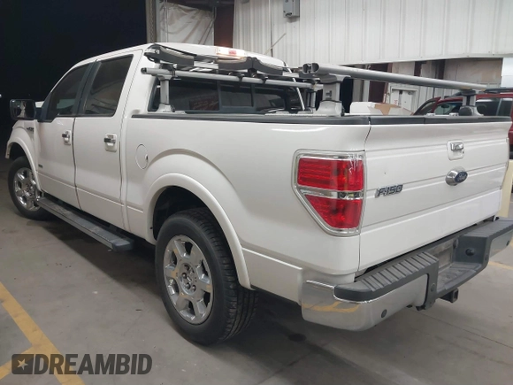 2013 Ford F-150 XL with VIN 1FTFW1CTXDKE87139, listed as a IAAI auction lot 41857584 with 156,837 mi miles and . Bid and sale history available at carsss.com. Image 3.