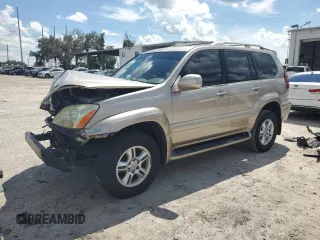 2004 Lexus GX 470 with VIN JTJBT20X340043730, listed as a Copart auction lot 73517824 with 203,606 mi miles and Salvage Title. Bid and sale history available at carsss.com. Image 1.