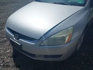 2003 Honda Accord Cpe EX with VIN 1HGCM72633A005608, listed as a IAAI auction lot 41929970 with 140,172 mi miles. Bid and sale history available at carsss.com. Image 6.