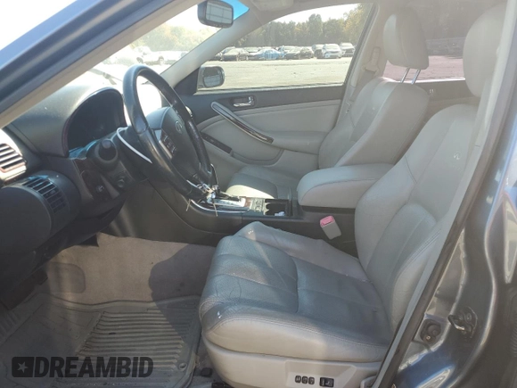 2006 Infiniti G35 with VIN JNKCV51F86M611859, listed as a Copart auction lot 74530294 with 138,029 mi miles and Salvage Title. Bid and sale history available at DreamBid. Image 7.