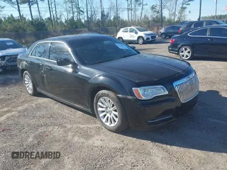 2012 Chrysler 300 with VIN 2C3CCAAG0CH138406, listed as a IAAI auction lot 41786393 with 192,111 mi miles. Bid and sale history available at carsss.com. Image 1.