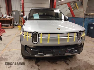 2024 Rivian R1S Adventure with VIN 7PDSGABA9RN039601, listed as a IAAI auction lot 40862472 with 6,186 mi miles. Bid and sale history available at carsss.com. Image 13.