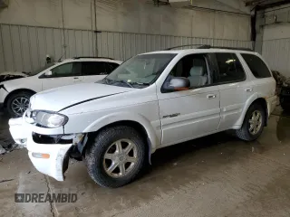 2002 Oldsmobile Bravada z VIN 1GHDT13S022177127, wystawiony jako Copart lot #57089015 z przebiegiem 168 771 mil mil oraz Nie do naprawy. Historia ofert i sprzedaży dostępna na DreamBid. Obrazek 1.