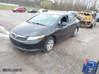 2012 Honda Civic Sdn LX with VIN 2HGFB2F52CH332302, listed as a IAAI auction lot 41836995 with 217,877 mi miles. Bid and sale history available at carsss.com. Image 2.