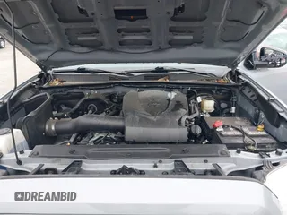 2021 Toyota Tacoma SR z VIN 3TMCZ5AN5MM372821, wystawiony jako IAAI lot #41886586 z przebiegiem 68 878 mil mil oraz . Historia ofert i sprzedaży dostępna na DreamBid. Obrazek 10.