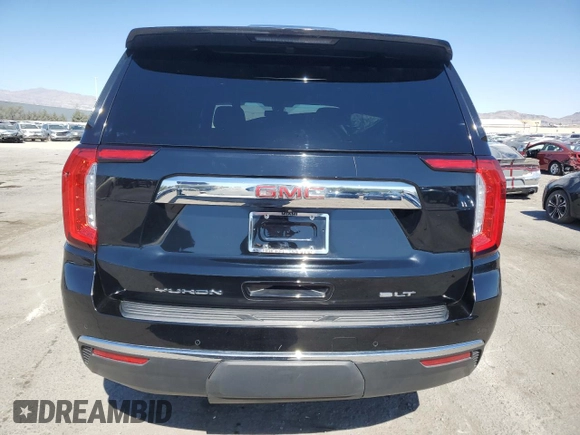 2021 GMC Yukon SLT with VIN 1GKS1BKDXMR119990, listed as a Copart auction lot 74733094 with 73,597 mi miles and Salvage Title. Bid and sale history available at carsss.com. Image 6.