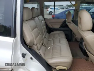 2002 Mitsubishi Montero Limited z VIN JA4MW51R52J027289, wystawiony jako Copart lot #71921024 z przebiegiem 199 334 mil mil oraz Tytuł czysty. Historia ofert i sprzedaży dostępna na DreamBid. Obrazek 11.