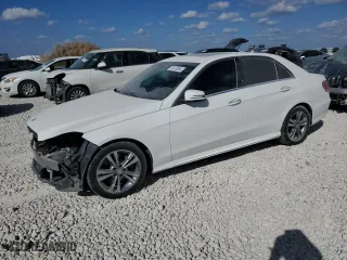 2015 Mercedes-Benz E-Class E 250 BlueTEC Luxury with VIN WDDHF0EB8FB157452, listed as a Copart auction lot 74910084 with 121,993 mi miles and Salvage Title. Bid and sale history available at carsss.com. Image 1.