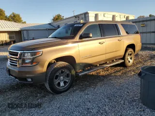 2015 Chevrolet Suburban LT with VIN 1GNSKJKC2FR737762, listed as a Copart auction lot 84349294 with 198,690 mi miles and Clean Title. Bid and sale history available at carsss.com. Image 1.