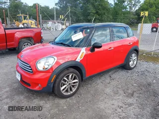 2012 MINI Countryman with VIN WMWZB3C57CWM06379, listed as a IAAI auction lot 42467193 with 100,485 mi miles and . Bid and sale history available at DreamBid. Image 2.