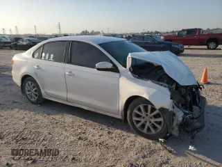 2012 Volkswagen Jetta SE with VIN 3VWBP7AJ6CM003102, listed as a Copart auction lot 52723985 with 224,706 mi miles and Salvage title. Bid and sale history available at DreamBid. Image 4.