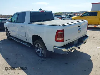 2023 Ram 1500 Laramie with VIN 1C6SRFJT0PN508550, listed as a IAAI auction lot 41913849 with 57,765 mi miles and . Bid and sale history available at DreamBid. Image 3.