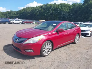 2013 Hyundai Azera z VIN KMHFH4JG7DA222410, wystawiony jako IAAI lot #40175444 z przebiegiem Nie podano mil oraz . Historia ofert i sprzedaży dostępna na DreamBid. Obrazek 2.