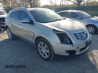 2014 Cadillac SRX Premium Collection z VIN 3GYFNDE37ES574109, wystawiony jako IAAI lot #41770404 z przebiegiem 66 478 mil mil oraz . Historia ofert i sprzedaży dostępna na DreamBid. Obrazek 1.