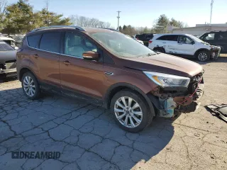 2017 Ford Escape Titanium with VIN 1FMCU9JDXHUA78843, listed as a Copart auction lot 42809485 with 93,562 mi miles and Salvage Title. Bid and sale history available at carsss.com. Image 4.