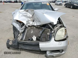 1999 Mercedes-Benz SLK 230/320 z VIN WDBKK47FXXF130104, wystawiony jako Copart lot #50151595 z przebiegiem Nie podano mil oraz Szkody całkowita. Historia ofert i sprzedaży dostępna na DreamBid. Obrazek 5.