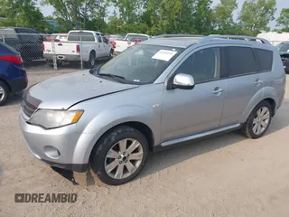 2009 Mitsubishi Outlander SE with VIN JA4LT31W09Z014816, listed as a IAAI auction lot 42399219 with 188,136 mi miles and . Bid and sale history available at DreamBid. Image 2.