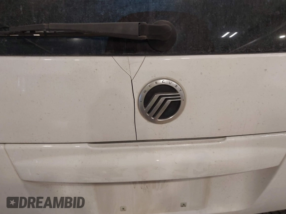 2002 Mercury Mountaineer with VIN 4M2ZU86E32ZJ23992, listed as a IAAI auction lot 41410337 with 231,739 mi miles and . Bid and sale history available at DreamBid. Image 6.