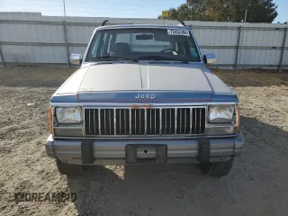 1991 Jeep Cherokee with VIN 1J4FJ58S1ML520376, listed as a Copart auction lot 75452364 with 147,982 mi miles and Salvage title. Bid and sale history available at DreamBid. Image 5.