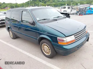 1994 Plymouth Voyager z VIN 2P4GH45R1RR703949, wystawiony jako IAAI lot #42330333 z przebiegiem 67 672 mil mil oraz . Historia ofert i sprzedaży dostępna na DreamBid. Obrazek 1.