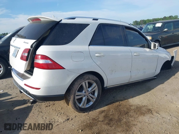 2014 Mercedes-Benz M 350 with VIN 4JGDA5HB9EA424811, listed as a IAAI auction lot 42079690 with 127,914 mi miles and . Bid and sale history available at DreamBid. Image 4.