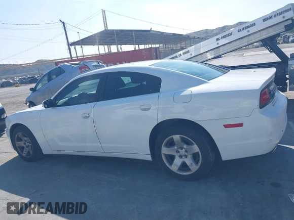 2013 Dodge Charger Police with VIN 2C3CDXAT9DH714055, listed as a IAAI auction lot 42099590 with Not Provided miles and . Bid and sale history available at DreamBid. Image 14.