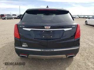 2017 Cadillac XT5 Platinum AWD z VIN 1GYKNFRS1HZ283589, wystawiony jako Copart lot #49140565 z przebiegiem 77 900 mil mil oraz Szkoda całkowita • Salvage title. Historia ofert i sprzedaży dostępna na DreamBid. Obrazek 6.