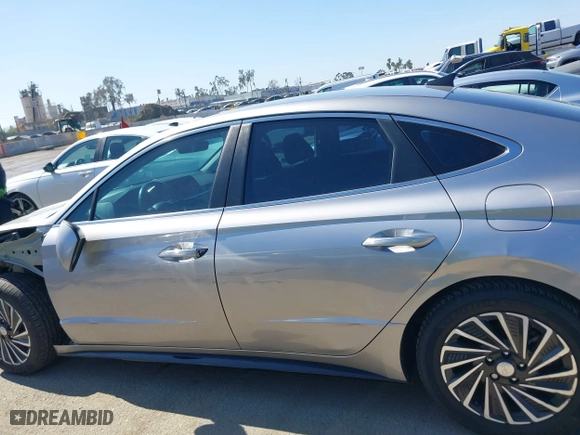 2021 Hyundai Sonata Hybrid SEL with VIN KMHL34JJ7MA026559, listed as a IAAI auction lot 41657589 with 119,019 mi miles. Bid and sale history available at carsss.com. Image 15.