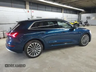 2019 Audi e-tron Prestige with VIN WA1VABGE2KB010143, listed as a Copart auction lot 52039045 with 62,991 mi miles and Salvage Title. Bid and sale history available at DreamBid. Image 3.