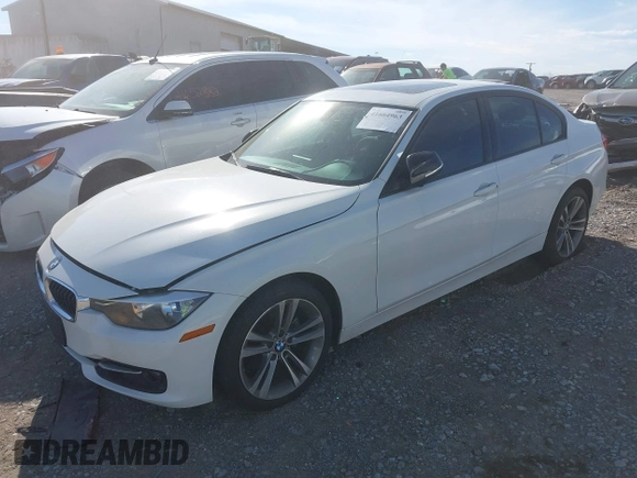 2013 BMW 3 Series 328i xDrive with VIN WBA3B5G59DNP40559, listed as a IAAI auction lot 41664963 with 97,103 mi miles. Bid and sale history available at carsss.com. Image 2.