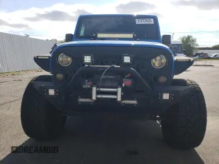 2016 Jeep Wrangler Unlimited Sport z VIN 1C4BJWDG3GL115622, wystawiony jako Copart lot #57872455 z przebiegiem 98 812 mil mil oraz Szkoda całkowita • Salvage title. Historia ofert i sprzedaży dostępna na DreamBid. Obrazek 5.