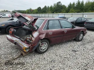 1989 Toyota Camry DLX z VIN 4T1SV21E1KU108151, wystawiony jako Copart lot #73657634 z przebiegiem 347 186 mil mil oraz Nie do naprawy • Non repairable. Historia ofert i sprzedaży dostępna na DreamBid. Obrazek 3.
