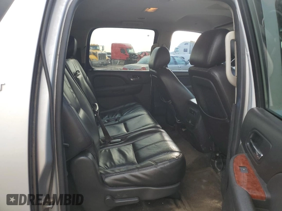 2012 Chevrolet Suburban LT z VIN 1GNSCJE01CR128642, wystawiony jako Copart lot #54210515 z przebiegiem Nie podano mil oraz Szkoda całkowita • Salvage title. Historia ofert i sprzedaży dostępna na DreamBid. Obrazek 11.