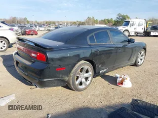 2014 Dodge Charger SXT with VIN 2C3CDXHG2EH369350, listed as a IAAI auction lot 41657478 with 120,566 mi miles. Bid and sale history available at carsss.com. Image 4.