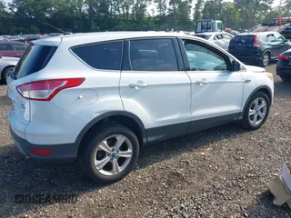 2013 Ford Escape SE with VIN 1FMCU9GX4DUB59039, listed as a IAAI auction lot 42722871 with 93,188 mi miles and . Bid and sale history available at DreamBid. Image 4.