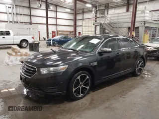 2014 Ford Taurus Limited z VIN 1FAHP2J8XEG112565, wystawiony jako IAAI lot #41554413 z przebiegiem 180 870 mil mil oraz . Historia ofert i sprzedaży dostępna na DreamBid. Obrazek 18.