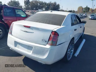 2014 Chrysler 300 S with VIN 2C3CCABG0EH235784, listed as a IAAI auction lot 41345692 with 109,920 mi miles and . Bid and sale history available at DreamBid. Image 4.