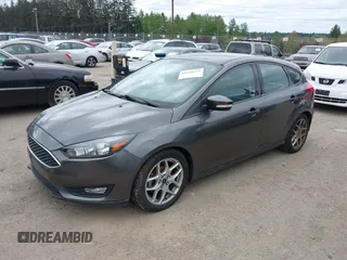 2015 Ford Focus SE with VIN 1FADP3K26FL269811, listed as a IAAI auction lot 42148333 with 157,192 mi miles. Bid and sale history available at carsss.com. Image 2.