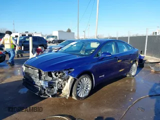 2016 Ford Fusion SE Hybrid with VIN 3FA6P0LU0GR388187, listed as a IAAI auction lot 38604646 with 135,625 mi miles. Bid and sale history available at carsss.com. Image 18.