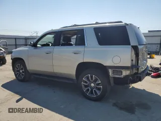 2016 Chevrolet Tahoe LS with VIN 1GNSCAKC7GR465949, listed as a Copart auction lot 50030625 with 136,608 mi miles and Salvage title. Bid and sale history available at DreamBid. Image 2.
