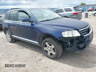 2004 Volkswagen Touareg z VIN WVGBC67L74D022414, wystawiony jako IAAI lot #42406140 z przebiegiem 149 900 mil mil oraz . Historia ofert i sprzedaży dostępna na DreamBid. Obrazek 1.