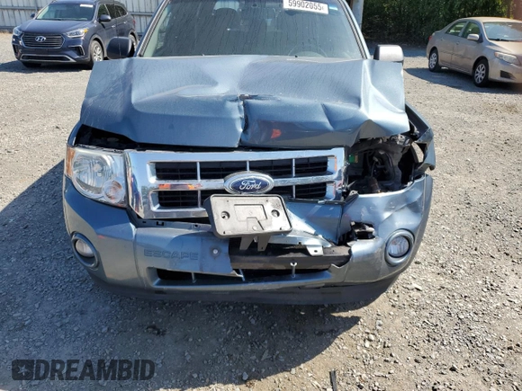 2012 Ford Escape XLT z VIN 1FMCU9DG1CKC54737, wystawiony jako Copart lot #59902055 z przebiegiem 206 067 mil mil oraz Szkoda całkowita • Salvage title. Historia ofert i sprzedaży dostępna na DreamBid. Obrazek 12.