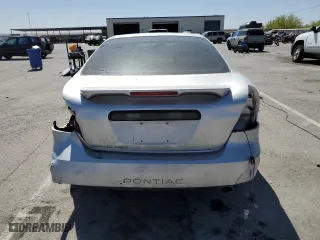 2005 Pontiac Grand Prix with VIN 2G2WP522251292946, listed as a Copart auction lot 54384854 with 147,415 mi miles and Salvage Title. Bid and sale history available at carsss.com. Image 6.