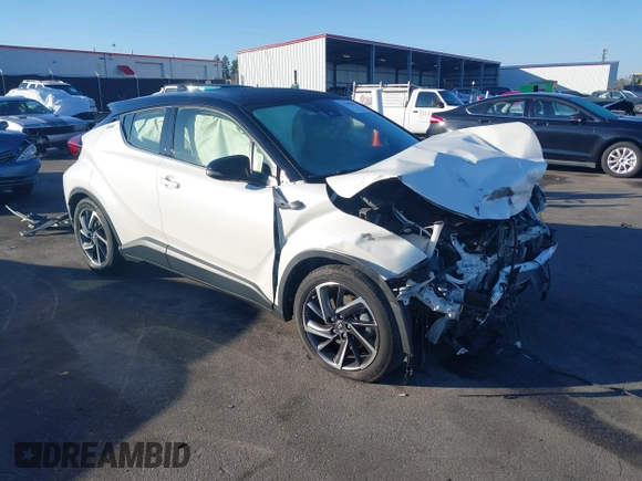 2021 Toyota C-HR LE with VIN JTNKHMBXXM1105546, listed as a IAAI auction lot 41486068 with 87,099 mi miles. Bid and sale history available at carsss.com. Image 1.