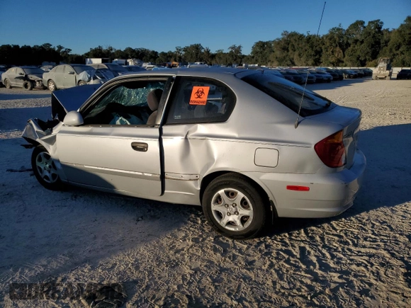 2005 Hyundai Accent GLS with VIN KMHCG35CX5U357839, listed as a Copart auction lot 81465454 with Not Provided miles and Salvage Title. Bid and sale history available at carsss.com. Image 2.