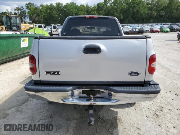 2000 Ford F-150 XL with VIN 1FTZF1727YNB38782, listed as a Copart auction lot 55749405 with 195,440 mi miles and Salvage title. Bid and sale history available at DreamBid. Image 6.