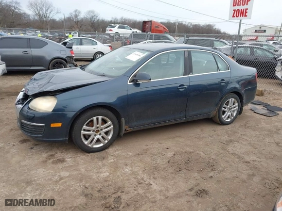 2006 Volkswagen Jetta Sedan 1.9L TDI with VIN 3VWST71K56M032034, listed as a IAAI auction lot 41498486 with 137,573 mi miles. Bid and sale history available at carsss.com. Image 14.