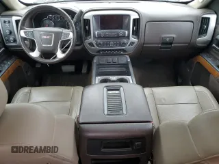 2017 GMC Sierra 1500 SLT z VIN 3GTU2NEC4HG150132, wystawiony jako Copart lot #50276125 z przebiegiem Nie podano mil oraz Szkody całkowita. Historia ofert i sprzedaży dostępna na DreamBid. Obrazek 8.
